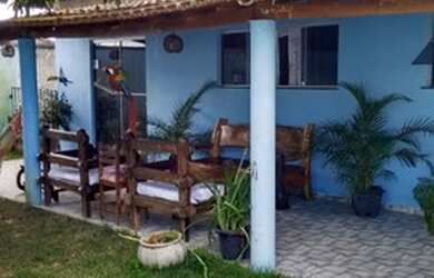 Imagem: A casa possui 4 Dormitórios, 5 Vagas na garagem e está localizado