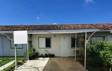 Imagem: A casa possui 3 Dormitórios, 1 Banheiro, 1 Vaga na garagem