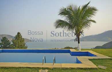 Imagem 7: Casa no alto da encosta com vista mar