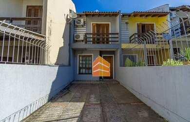 Imagem: A casa possui 3 Dormitórios, 1 Banheiro, 2 Vagas na garagem