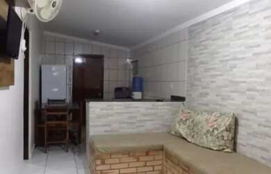 Imagem: A casa possui 2 Dormitórios, 1 Banheiro, 2 Vagas na garagem