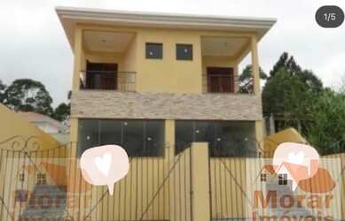 Imagem: A casa possui 3 Dormitórios, 2 Banheiros, 2 Vagas na garagem