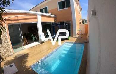 Imagem: A casa possui 3 Dormitórios, 5 Banheiros, 3 Vagas na garagem