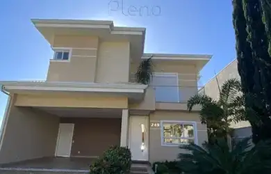 Imagem: A casa possui 3 Dormitórios, 5 Banheiros, 4 Vagas na garagem