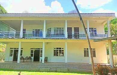 Imagem: A casa possui 5 Dormitórios, 5 Banheiros, 5 Vagas na garagem