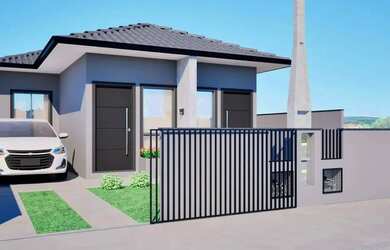 Imagem: A casa possui 2 Dormitórios, 1 Banheiro, 2 Vagas na garagem