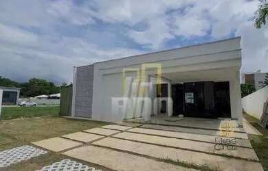 Imagem: A casa possui 3 Dormitórios, 3 Banheiros, 4 Vagas na garagem