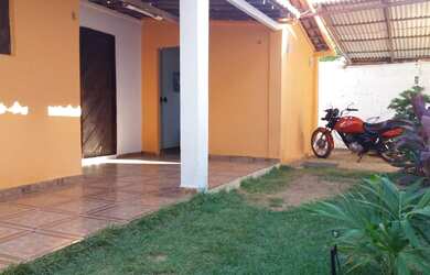 Imagem: A casa possui 3 Dormitórios, 1 Vaga na garagem e está localizado