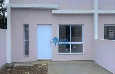 Imagem: A casa possui 3 Dormitórios, 1 Banheiro, 2 Vagas na garagem