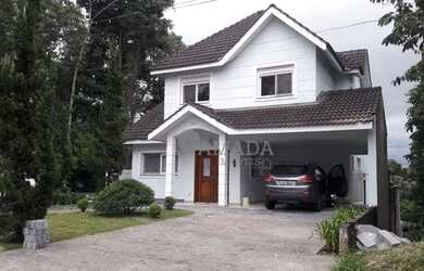 Imagem: A casa em condomínio possui 5 Dormitórios, 5 Banheiros, 4