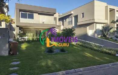 Imagem: A casa em condomínio possui 5 Dormitórios, 5 Banheiros, 573m²