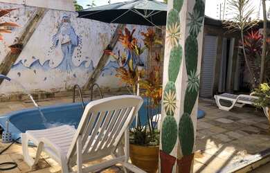 Imagem: A casa possui 3 Dormitórios, 3 Banheiros, 2 Vagas na garagem