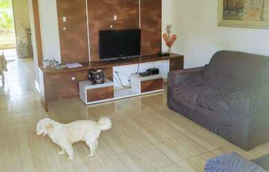 Imagem: A casa possui 3 Dormitórios, 2 Banheiros, 3 Vagas na garagem