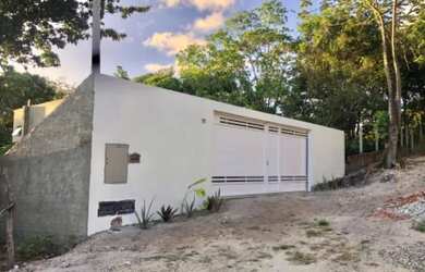 Imagem: A casa possui 2 Dormitórios, 1 Banheiro, 2 Vagas na garagem