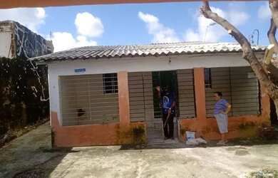 Imagem: A casa possui 2 Dormitórios, 1 Banheiro, 1 Vaga na garagem