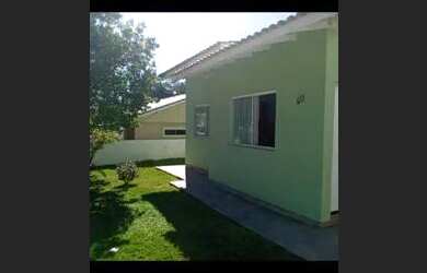 Imagem: A casa possui 3 Dormitórios, 2 Banheiros, 3 Vagas na garagem