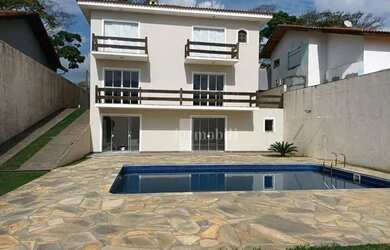 Imagem: A casa em condomínio possui 4 Dormitórios, 4 Banheiros, 5