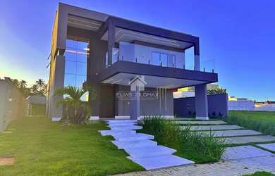 Imagem: A casa em condomínio possui 4 Dormitórios, 5 Banheiros, 4