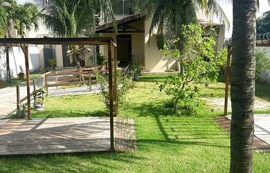 Imagem: A casa possui 5 Dormitórios, 3 Banheiros, 5 Vagas na garagem