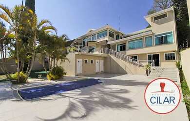 Imagem: A casa possui 5 Dormitórios, 5 Banheiros, 5 Vagas na garagem