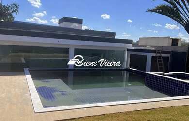 Imagem: A casa possui 3 Dormitórios, 5 Banheiros, 5 Vagas na garagem