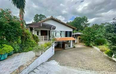 Imagem: A casa possui 2 Dormitórios, 2 Banheiros, 3 Vagas na garagem