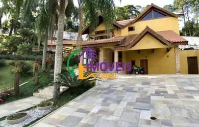 Imagem: A casa em condomínio possui 4 Dormitórios, 4 Banheiros, 4