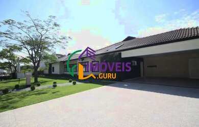 Imagem: A casa em condomínio possui 4 Dormitórios, 5 Banheiros, 4