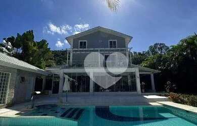 Imagem: A casa em condomínio possui 5 Dormitórios, 5 Banheiros, 5