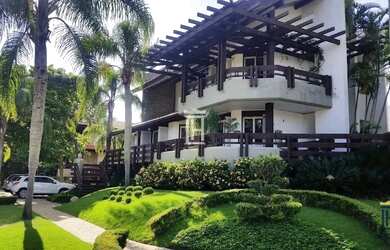 Imagem: A casa possui 5 Dormitórios, 5 Banheiros, 5 Vagas na garagem