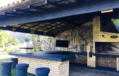 Imagem 12: Casa no alto da encosta com vista mar