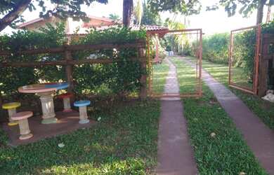 Imagem: A casa possui 3 Dormitórios, 4 Vagas na garagem e está localizado