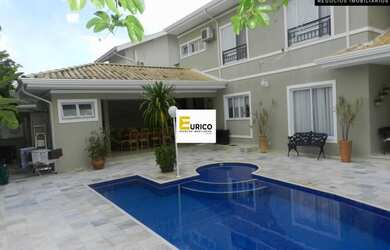 Imagem: A casa em condomínio possui 4 Dormitórios, 5 Banheiros, 2