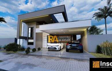 Imagem: A casa possui 3 Dormitórios, 2 Banheiros, 2 Vagas na garagem