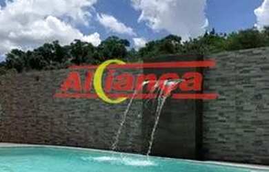 Imagem: A casa possui 3 Dormitórios, 4 Banheiros, 3 Vagas na garagem