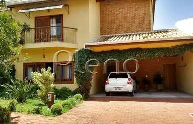 Imagem: A casa possui 4 Dormitórios, 4 Banheiros, 4 Vagas na garagem