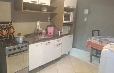 Imagem: A casa possui 2 Dormitórios, 1 Banheiro, 1 Vaga na garagem