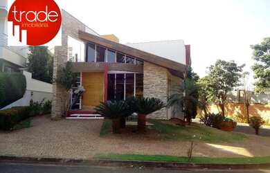 Imagem: A casa em condomínio possui 4 Dormitórios, 5 Banheiros, 2