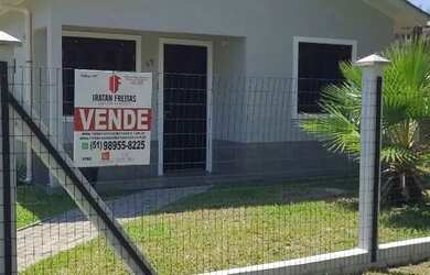 Imagem: A casa possui 5 Dormitórios, 3 Banheiros, 4 Vagas na garagem