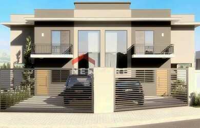 Imagem: A casa possui 2 Dormitórios, 3 Banheiros, 2 Vagas na garagem