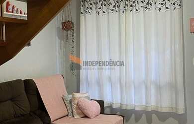 Imagem: A casa possui 2 Dormitórios, 3 Banheiros, 1 Vaga na garagem