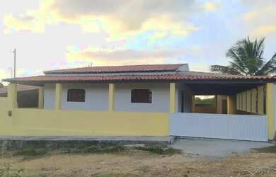 Imagem: A casa possui 3 Dormitórios, 3 Vagas na garagem e está localizado