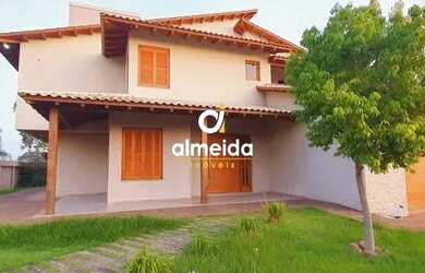 Imagem: A casa possui 5 Dormitórios, 5 Banheiros, 5 Vagas na garagem