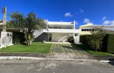 Imagem: A casa possui 4 Dormitórios, 4 Banheiros, 4 Vagas na garagem