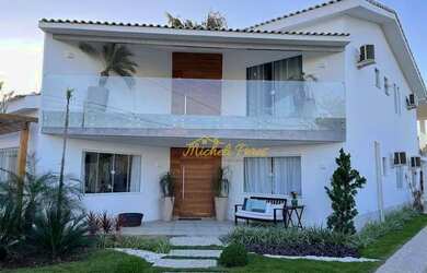 Imagem: A casa possui 4 Dormitórios, 5 Banheiros, 5 Vagas na garagem