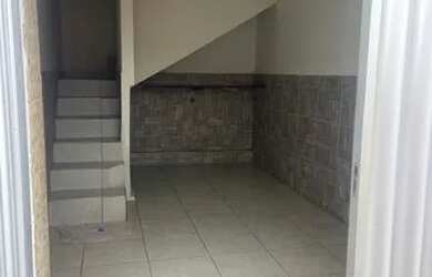 Imagem: A casa possui 2 Dormitórios, 2 Banheiros, 1 Vaga na garagem