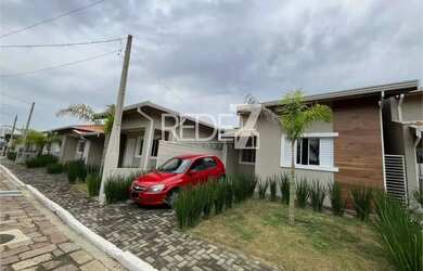 Imagem: A casa em condomínio possui 3 Dormitórios, 2 Banheiros, 2