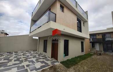 Imagem: A casa possui 3 Dormitórios, 4 Banheiros, 2 Vagas na garagem