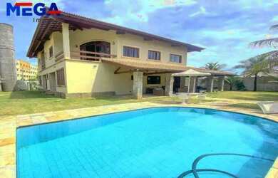 Imagem: A casa possui 5 Dormitórios, 5 Banheiros, 372m² de Área e