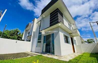 Imagem: A casa possui 2 Dormitórios, 2 Banheiros, 1 Vaga na garagem